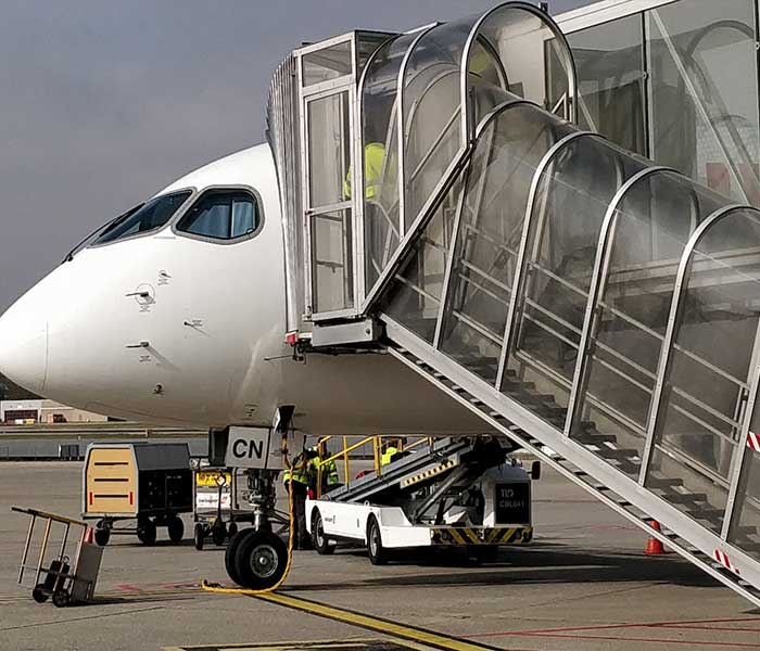 Professional ground handling crew servicing an aircraft
